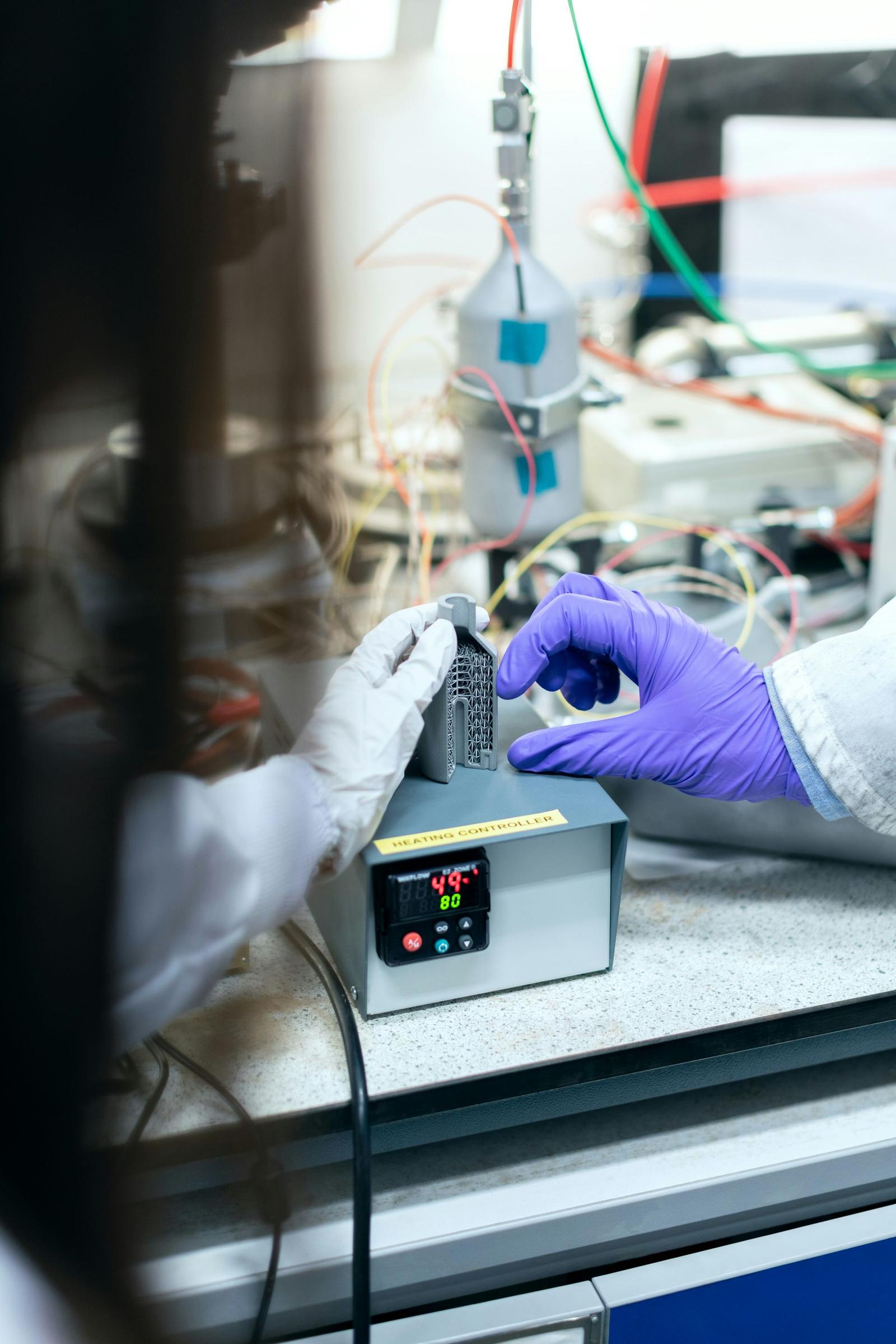Technician tests a refurbished breaker in a lab